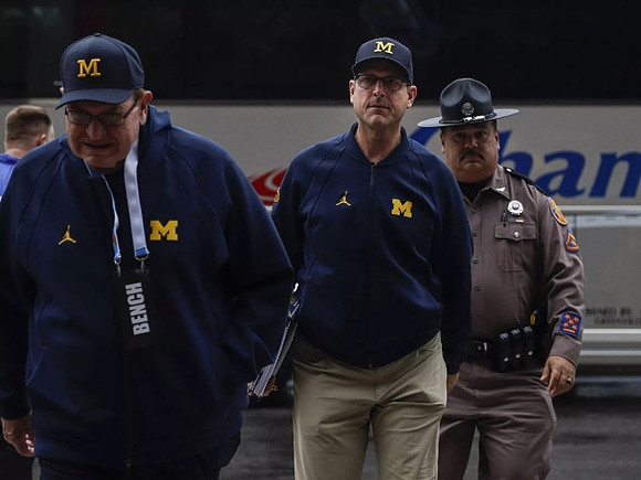 Jon Falk and Jim Harbaugh