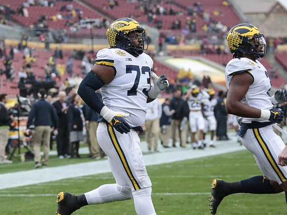 Maurice Hurst (73) and Rashan Gary (3)