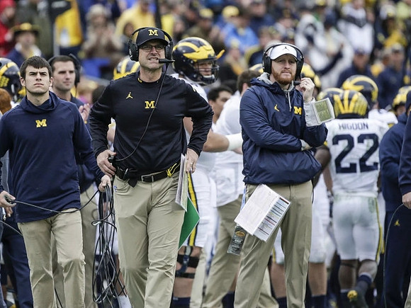 Jim Harbaugh, Jay Harbaugh, and Karan Higdon (22)