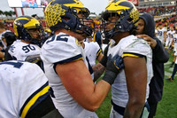 Bryan Mone (90), Mason Cole (52), and Rashan Gary (3)