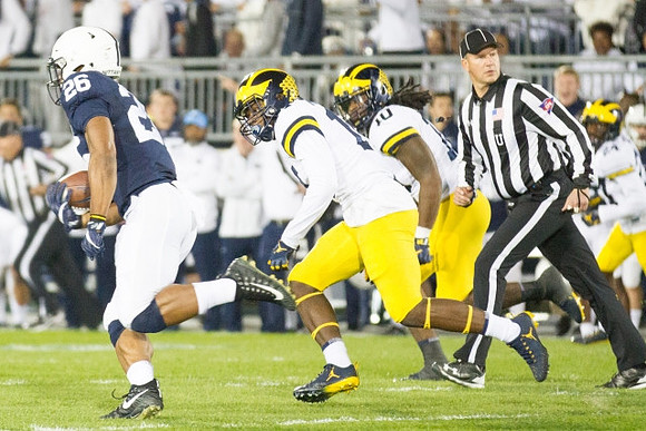Josh Metellus (14) and Devin Bush (10)