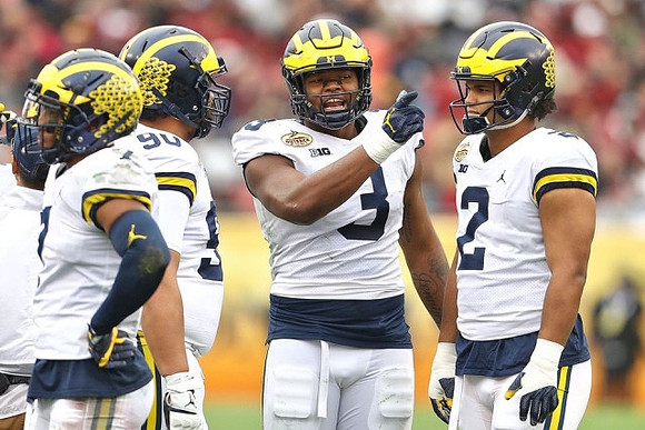 Khaleke Hudson (7), Bryan Mone (90), Rashan Gary (3), and Carlo Kemp (2)