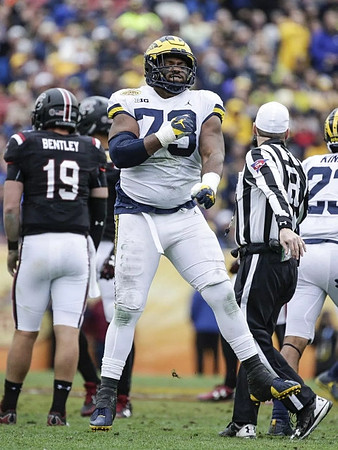 Maurice Hurst (73) and Tyree Kinnel (23)