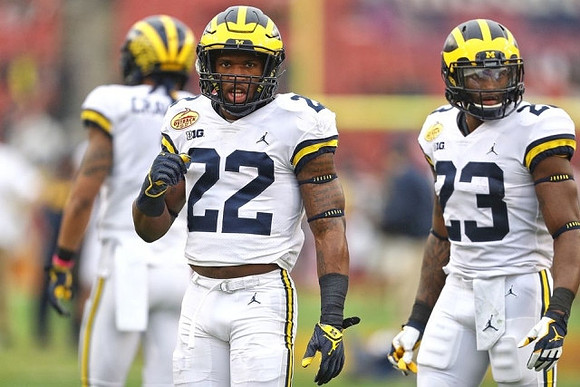 Karan Higdon (22) and O'Maury Samuels (23)