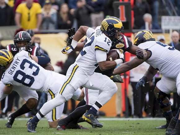 Zach Gentry (83) and Chris Evans (12)