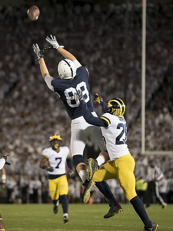 Khaleke Hudson (7) and Brandon Watson (28)