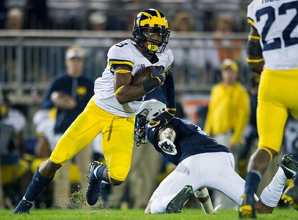 Donovan Peoples-Jones (9) and Karan Higdon (22)