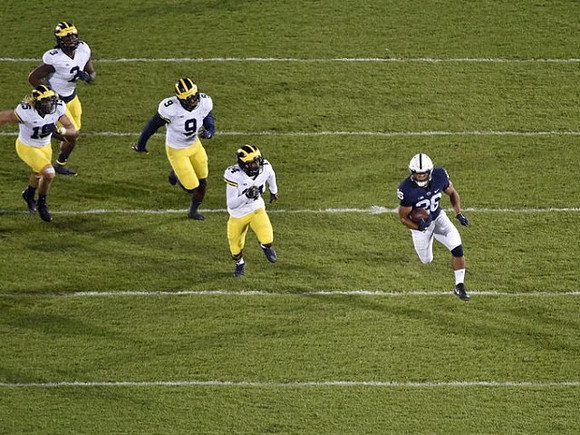 Chase Winovich (15), Rashan Gary (3), Mike McCray (9), and Josh Metellus (14)