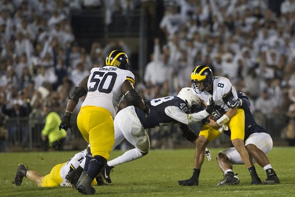 Henry Poggi (19), Michael Onwenu (50), and John O'Korn (8)