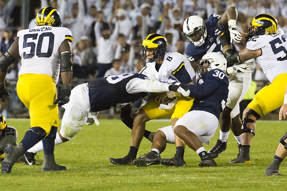 Michael Onwenu (50), John O'Korn (8), and Mason Cole (52)