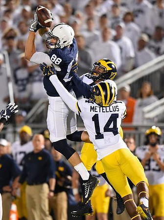 Josh Metellus (14) and Brandon Watson (28)