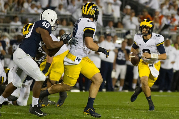 Henry Poggi (19) and John O'Korn (8)