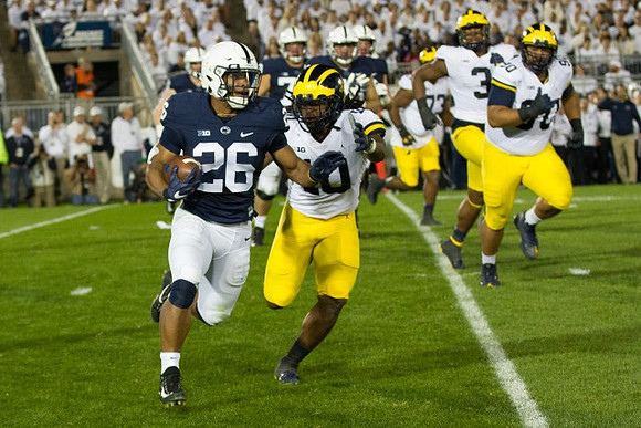 Devin Bush (10), Rashan Gary (3), and Bryan Mone (90)