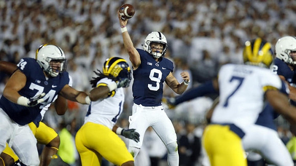 Devin Bush (10) and Khaleke Hudson (7)