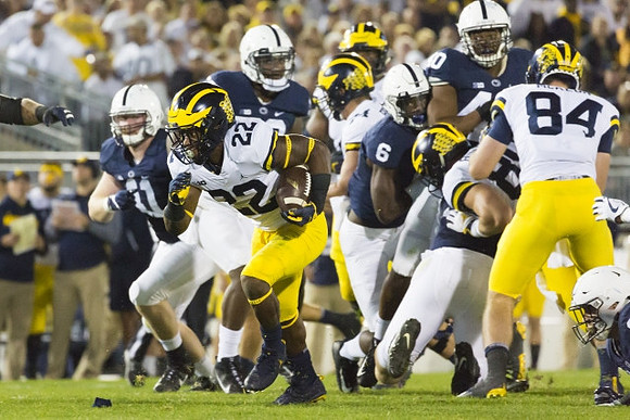Karan Higdon (22) and Sean McKeon (84)
