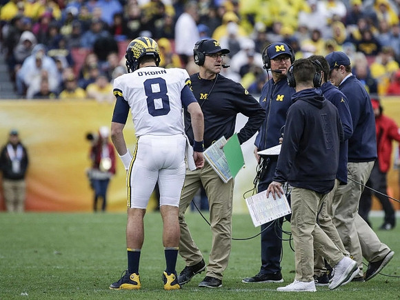John O'Korn (8), Jim Harbaugh, and Tim Drevno
