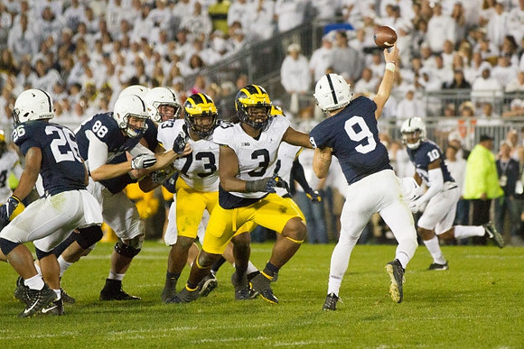 Rashan Gary (3) and Maurice Hurst (73)