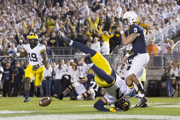 Kwity Paye (19) and Khaleke Hudson (7)