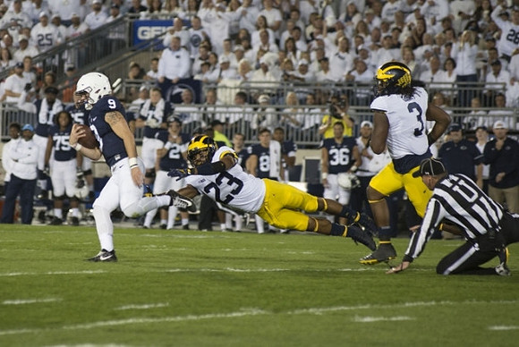 Tyree Kinnel (23) and Rashan Gary (3)