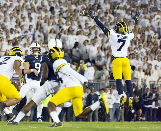 Carlo Kemp (2), Josh Metellus (14), and Khaleke Hudson (7)