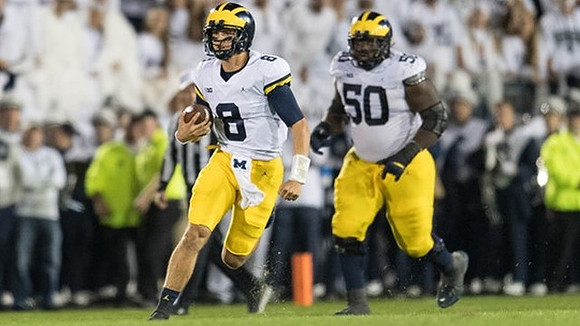 John O'Korn (8) and Michael Onwenu (50)