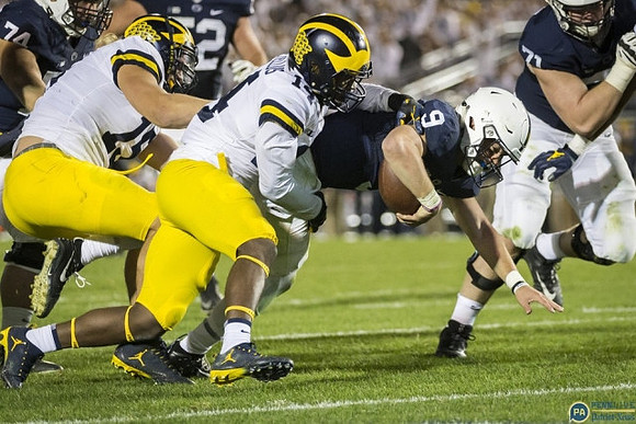 Chase Winovich (15) and Josh Metellus (14)