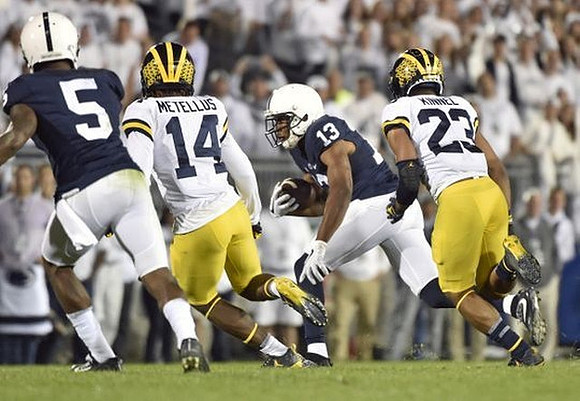 Josh Metellus (14) and Tyree Kinnel (23)