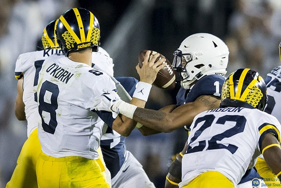 John O'Korn (8), Patrick Kugler (57), and Karan Higdon (22)