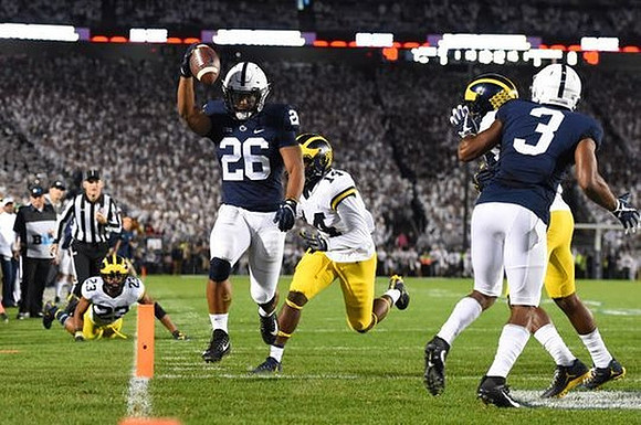 Tyree Kinnel (23) and Josh Metellus (14)