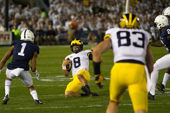 John O'Korn (8) and Zach Gentry (83)