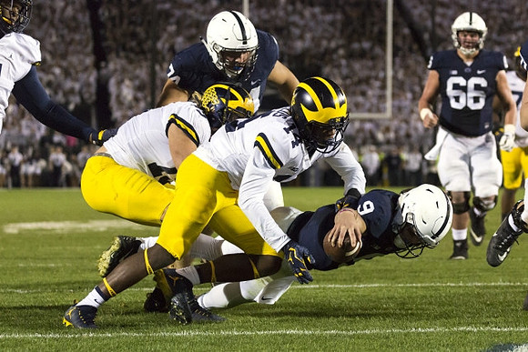 Chase Winovich (15) and Josh Metellus (14)