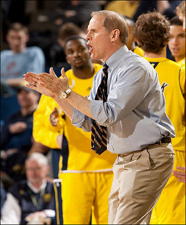 Corey Person (32) and John Beilein