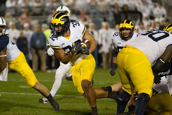 Ty Isaac (32), Mason Cole (52), and Michael Onwenu (50)