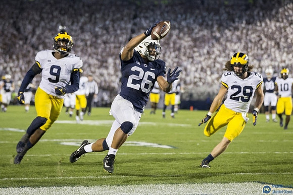 Mike McCray (9), Jordan Glasgow (29), and Devin Bush (10)