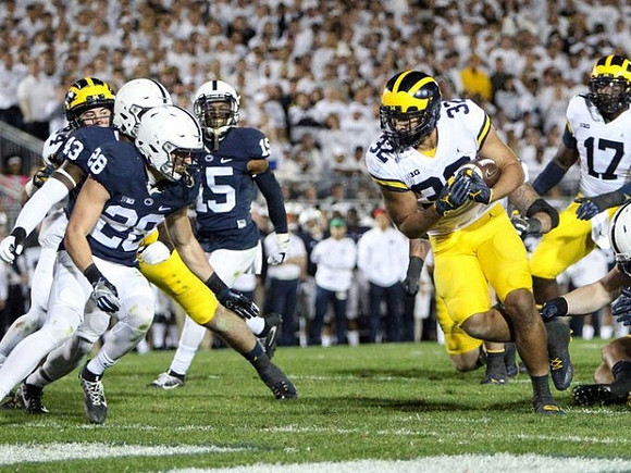 Sean McKeon (84), Ty Isaac (32), and Tyrone Wheatley Jr. (17)