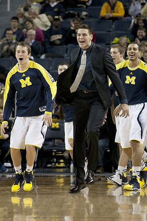 Andrew Dakich (5), Mitch McGary (4), Mark Donnal (34), and Jordan Morgan (52)