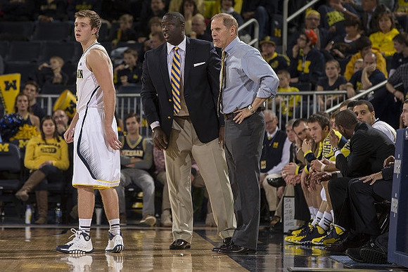Spike Albrecht (2), Bacari Alexander, and John Beilein