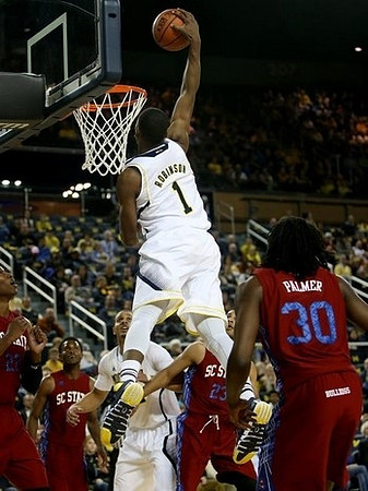 Glenn Robinson III (1) and Jordan Morgan (52)