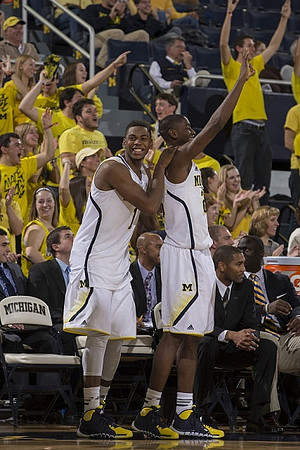 Glenn Robinson III (1), Caris LeVert (23), C.J. Lee, LaVall Jordan, and Bacari Alexander