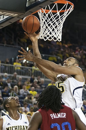Glenn Robinson III (1) and Jon Horford (15)