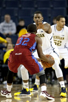 Glenn Robinson III (1) and Jordan Morgan (52)