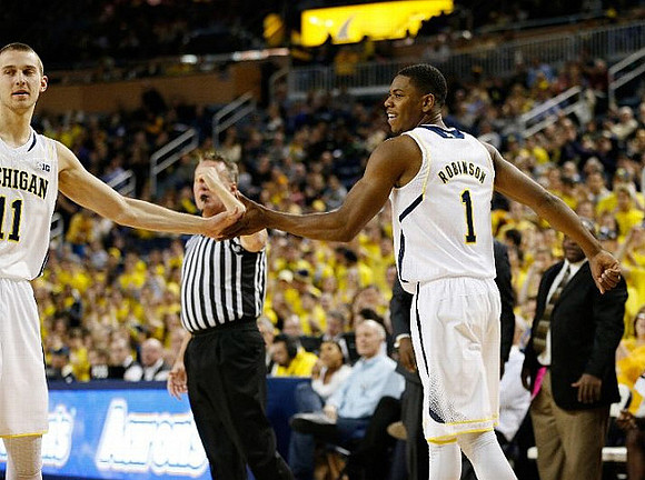 Nik Stauskas (11) and Glenn Robinson III (1)