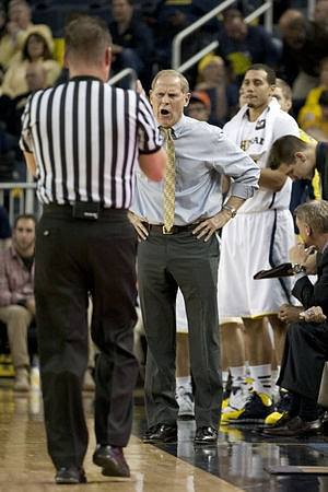 John Beilein, Jordan Morgan (52), and Jeff Meyer