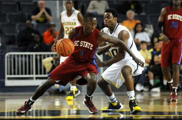 Caris LeVert (23) and Derrick Walton Jr. (10)