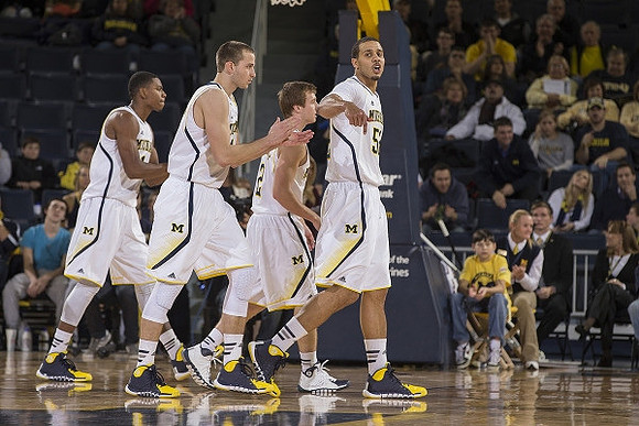 Glenn Robinson III (1), Nik Stauskas (11), Spike Albrecht (2), and Jordan Morgan (52)