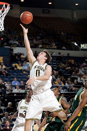 Zack Novak (0) and Manny Harris (3)