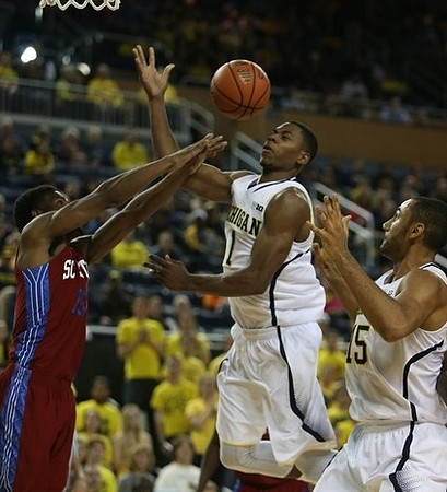 Glenn Robinson III (1) and Jon Horford (15)