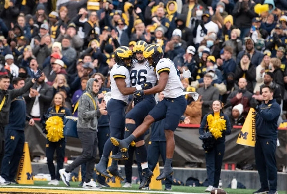 Donovan Edwards (7), Luke Schoonmaker (86), and Cornelius Johnson (6)