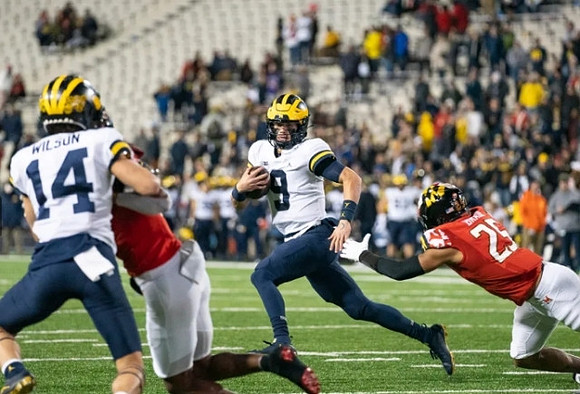 Roman Wilson (14) and J.J. McCarthy (9)