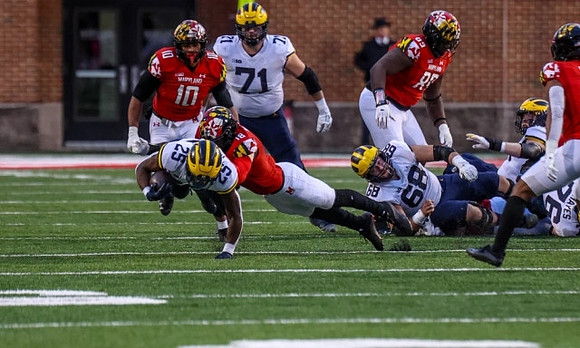 Hassan Haskins (25), Andrew Stueber (71), Andrew Vastardis (68), and Ryan Hayes (76)
